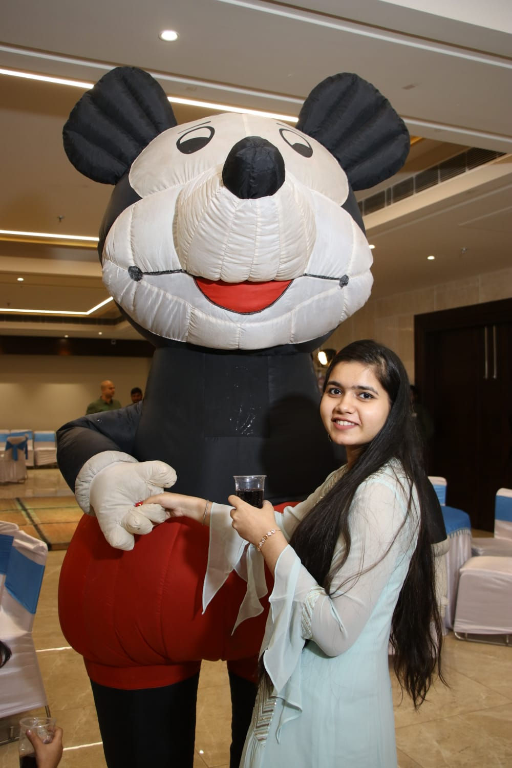 Inflatable character mascot costume at a birthday party