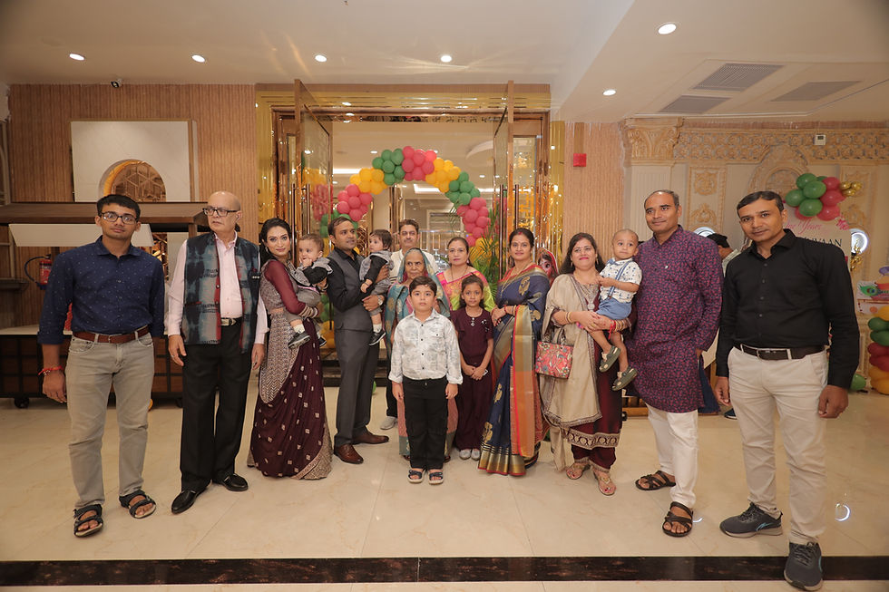Family group photo at a baby's first celebration