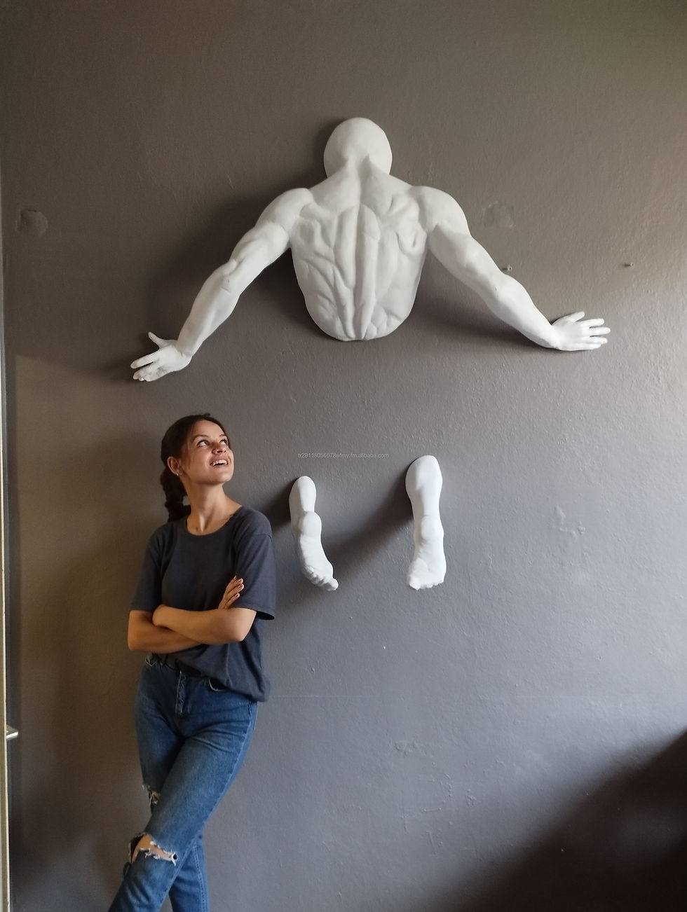 Thumbnail: Life Size Statue of Man Coming Out of Wall