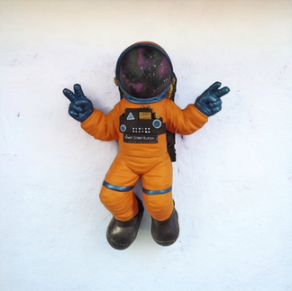 large astronaut wall sculpture