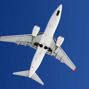 Aircraft flying in blue sky