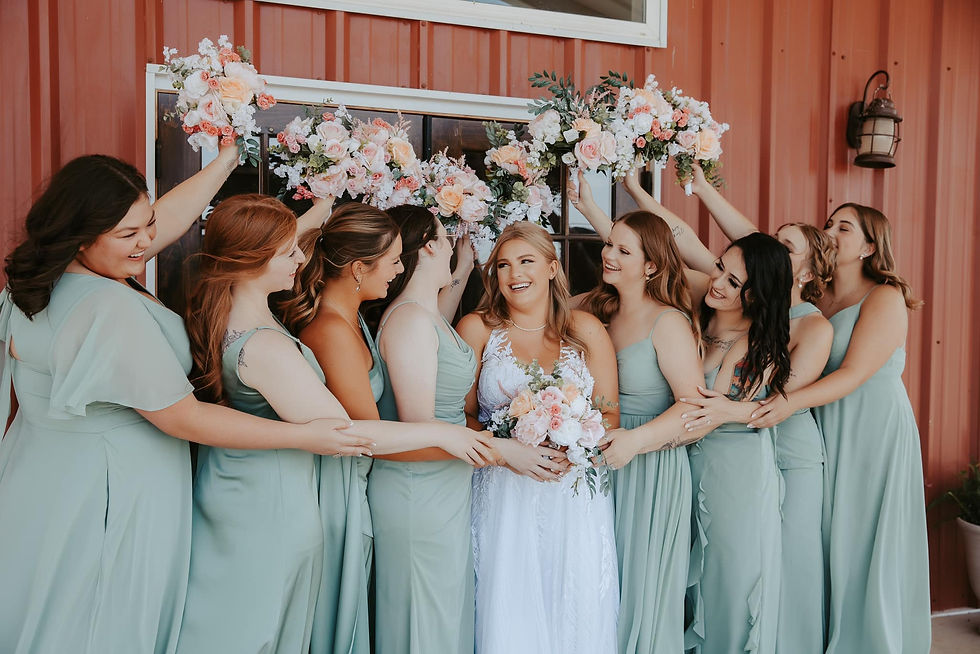 bride and her bridesmaids in pastel wedding colors at wedding venue near amarillo texas, front porch at cornerstone ranch in pastel wedding dress colors and fresh floral arrangements for spring wedding, summer wedding at cornerstone ranch, summer wedding in amarillo