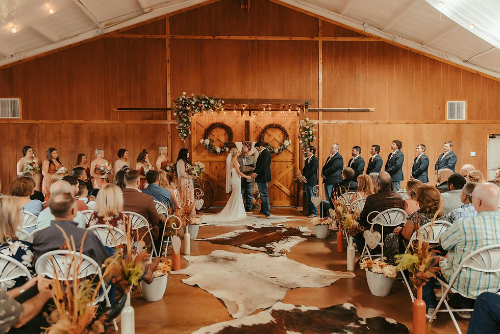 Wedding ceremony set up indoors at a barn venue near Amarillo, Texas