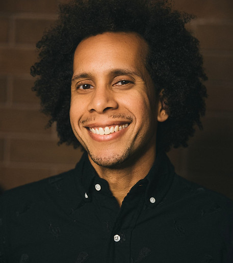 eric b black shirt portrait 2 (low res).jpg