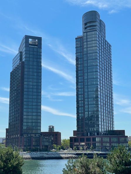 two skyscrapers with Mannix windows installed