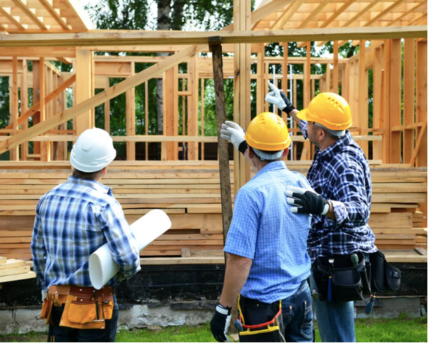 Residential building plans and construction documents representing Canadian building permit delays and mortgage planning for new home construction.