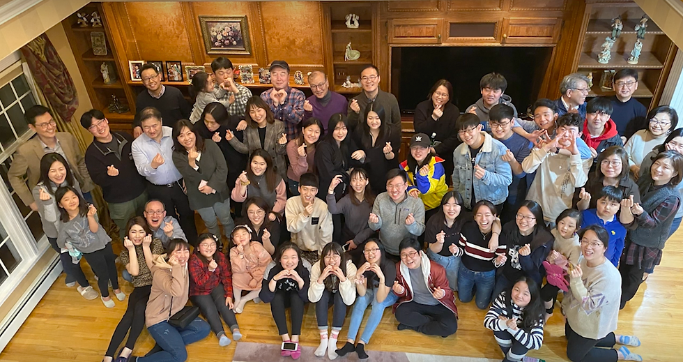 Host families, children, and volunteers gathered together during a Let’s Be Family visit.