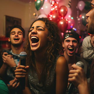 Group of friends singing karaoke at a house party