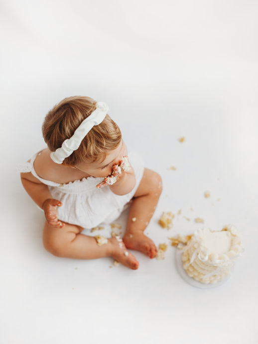1st birthday baby cake smash, photoshoot,  Hertfordshire Photographer, near Stevenage, Letchworth, Hitchin, St. Albans, Welwyn Garden City, Biggleswade, Sandy, Royston