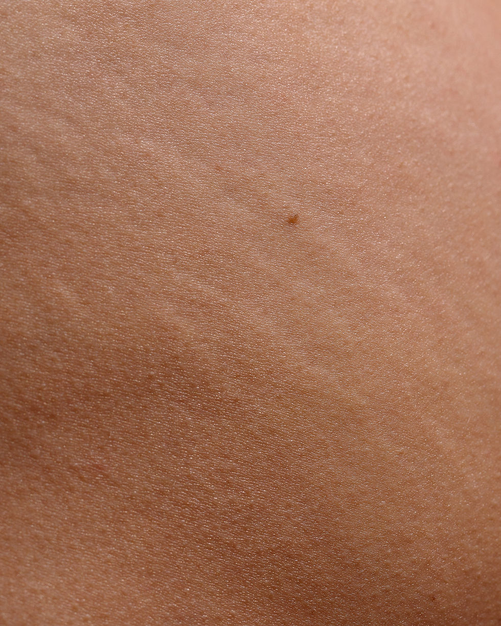 closeup-macro-shot-showing-natural-texture-woman-s-skin-with-visible-stretch-marks (1).jpg
