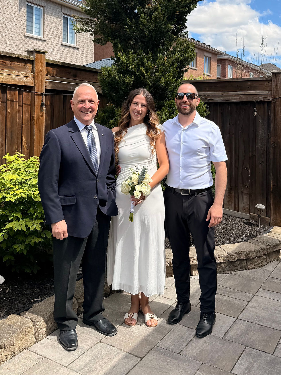 Alexa and Adrian with Rev. Pat