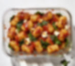 Gnocchis avec sauce tomate, épinards et feta gratinée.