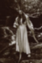Woman in front of waterfall holding enormous python, Buck County Fine Art Photographer, Lexi Bird Photography