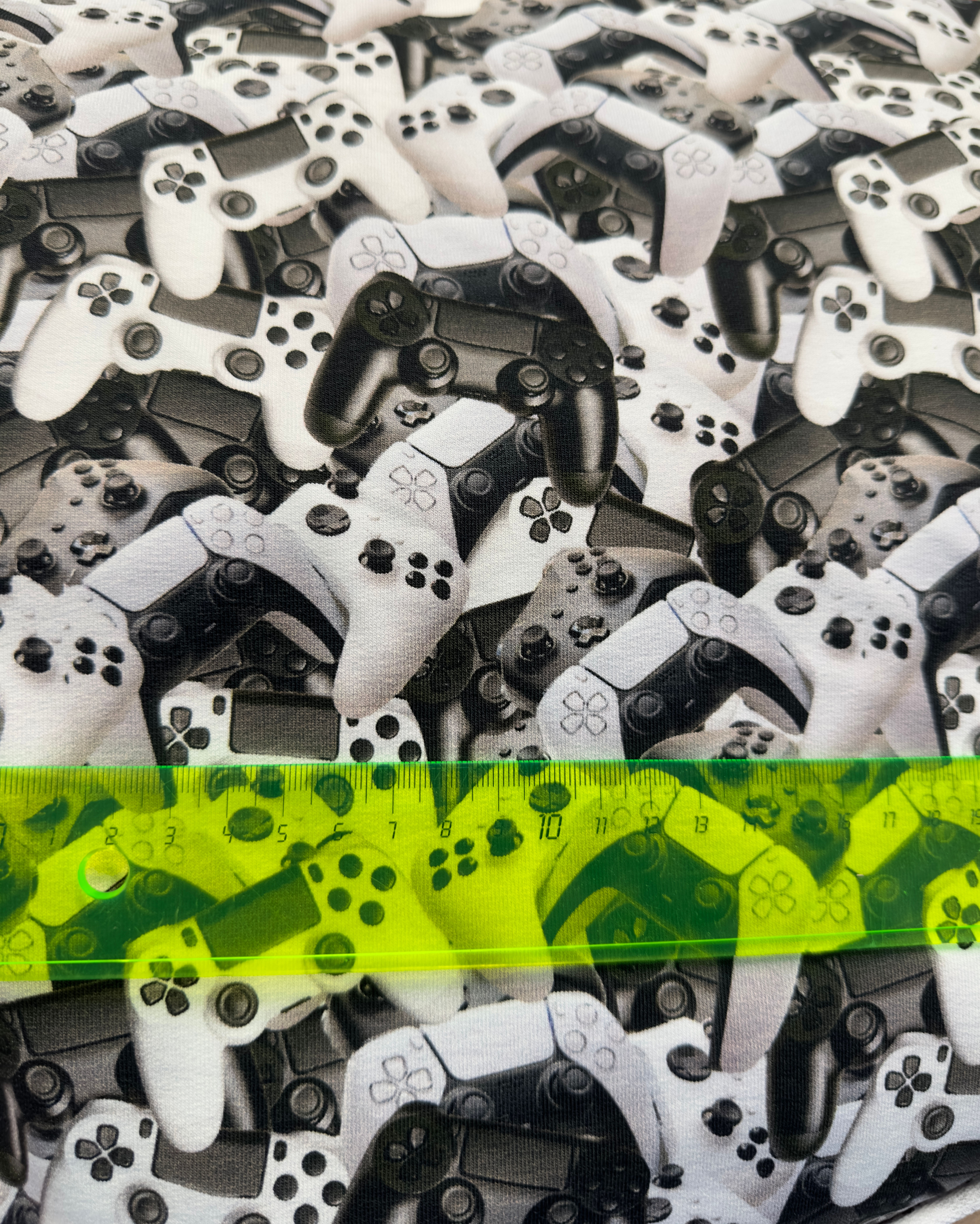 French Terry med spillkonsolltrykk