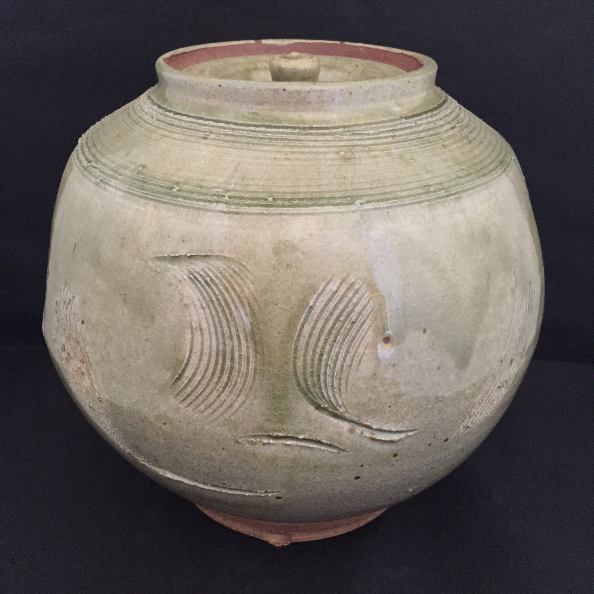 wide covered vase