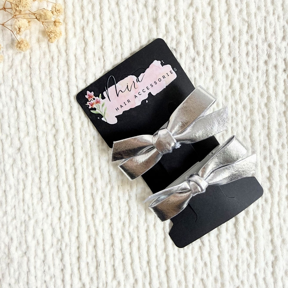 Thumbnail: Metallic Silver Bow Hair Clips — bow hair clips, detail view 3. Mira Accessories, handmade in South Africa