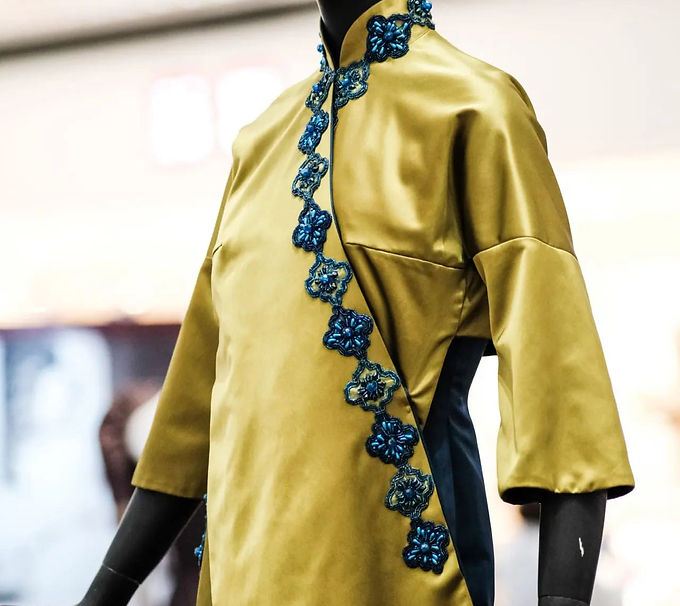 Reproduction of a Siamese-inspired coat and gown created in 1956..jpg