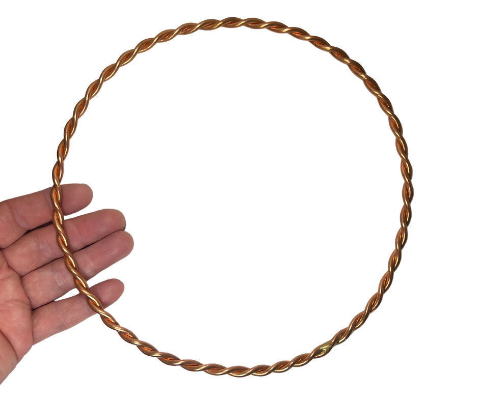 Hand holding 8" GFL Tensor Ring