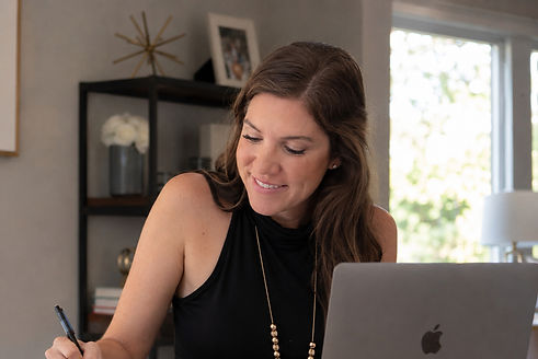 Brandy Bryars Rogers working in office setting