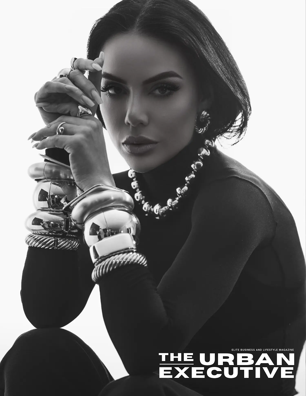 Lívia Gueissaz on the cover of the urban executive magazine wearing black body suit by Mugler and jewelry by David Yurman and schiaparelli