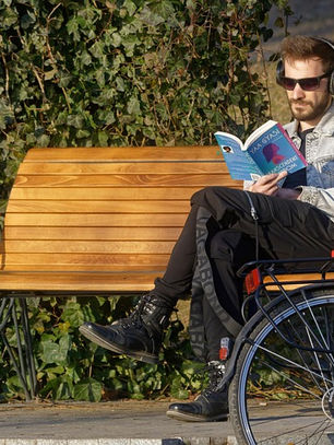 Man relaxing on park bench