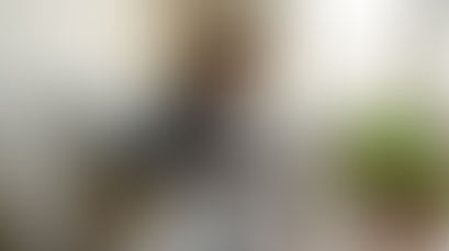 Woman journaling mindfulness in living room