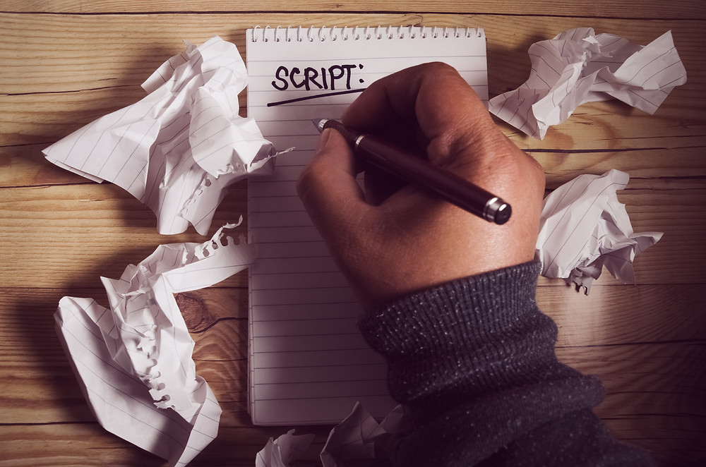 Writing a telemarketing script on paper