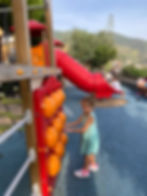 Kids enjoying the fun playground in Monterosso al Mare, perfect for family relaxation in Cinque Terr