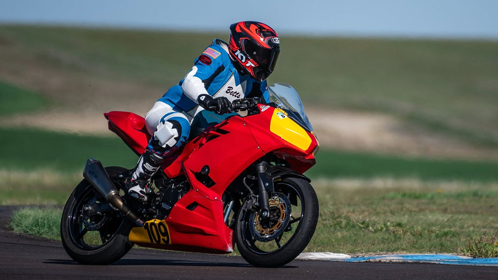 Photo of Betsy on her Kawasaki Ninja 400.