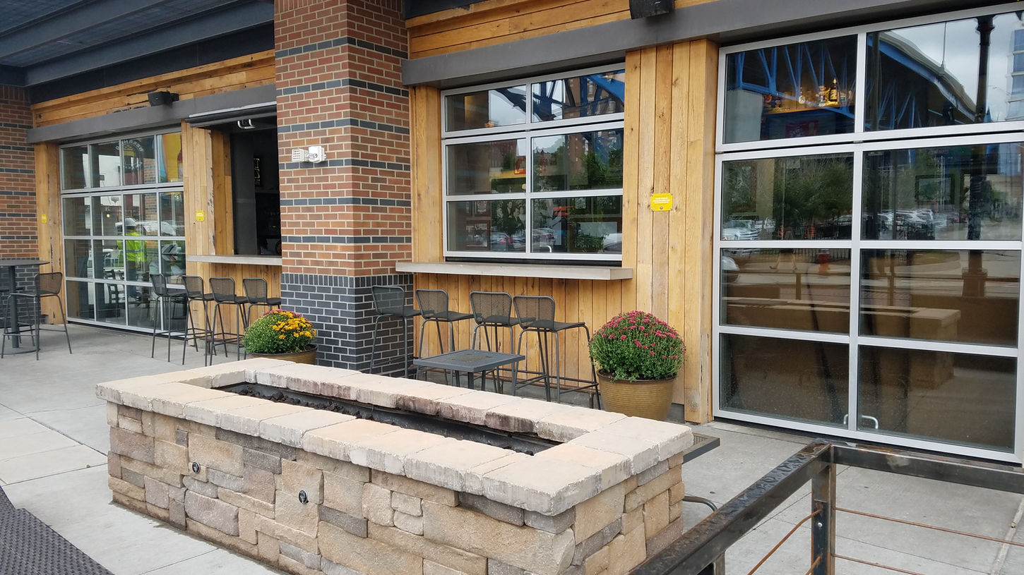 This Northeast residence is ready for all seasons with an amazing indoor-outdoor patio.