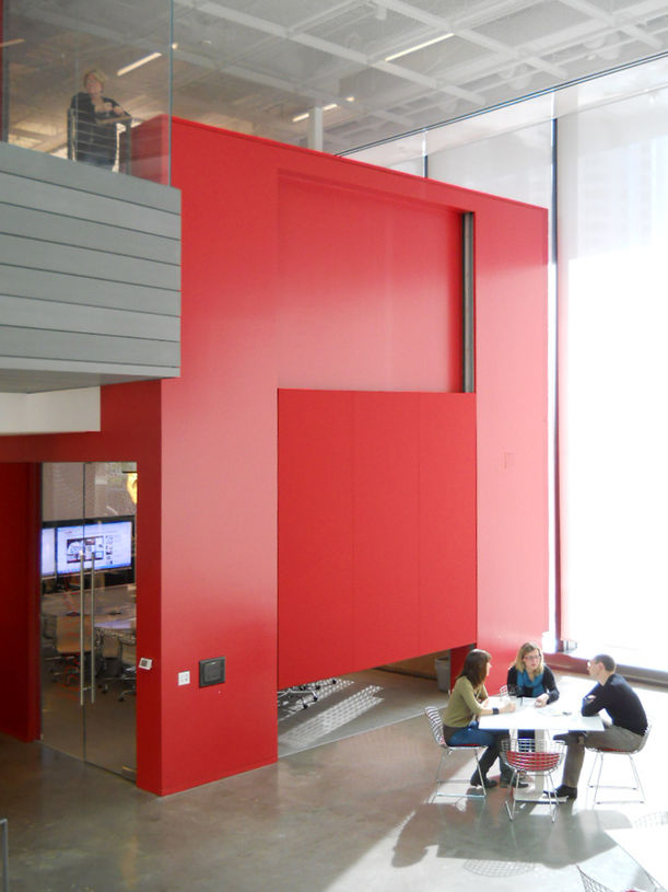 The small conference room can be closed off for meetings as needed.