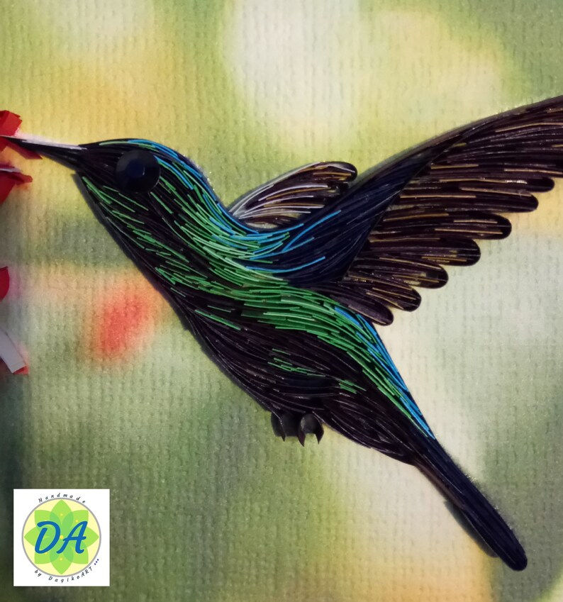 Thumbnail: Framed art of a hummingbird