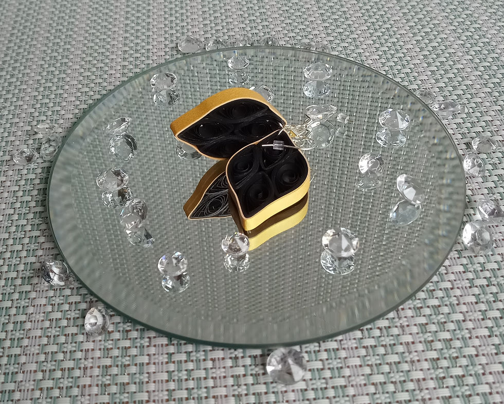 Black earrings with golden edges