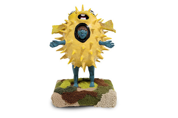 Woman in a pufferfish suit, mixed media sculpture by Clarine Wilmar
