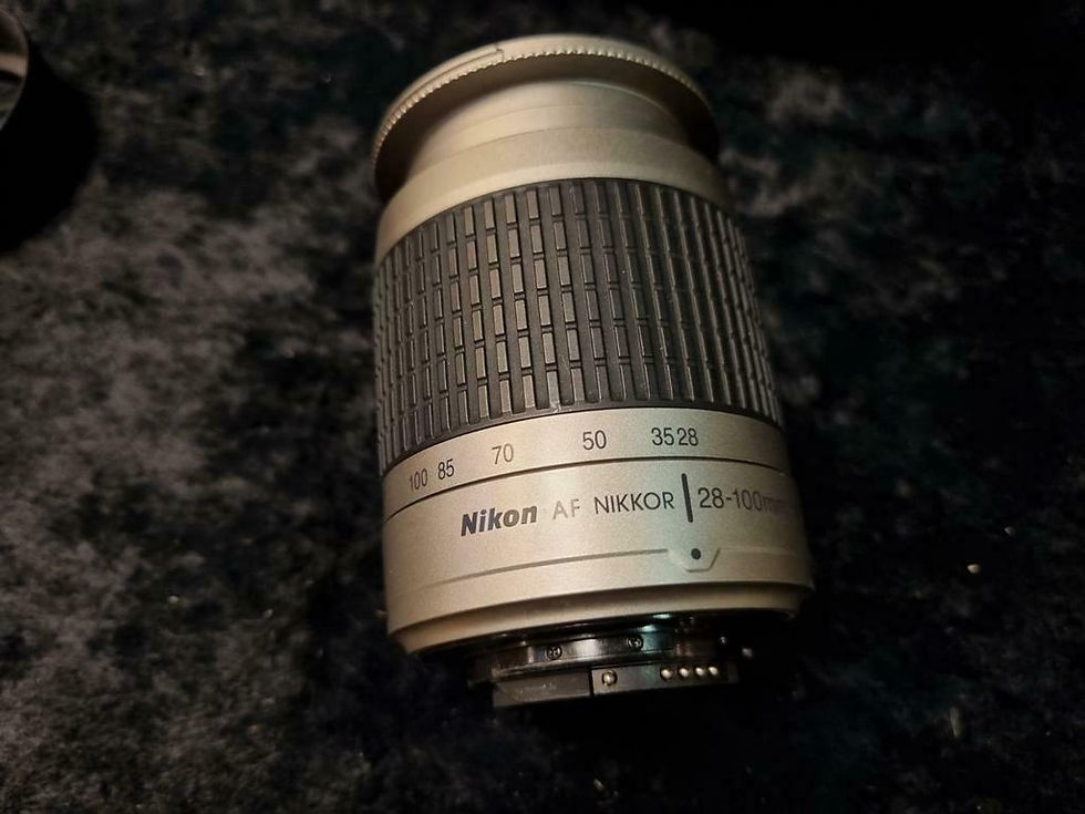 Thumbnail: Nikon D100 + 28-100 mm lens compleet met doos