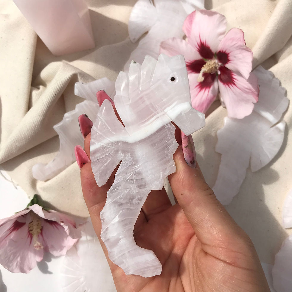Handcarved pink calcite seahorse