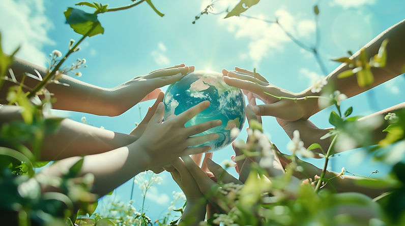 Hands touching a clear crystal ball with a reflection of the world's oceans and lands.