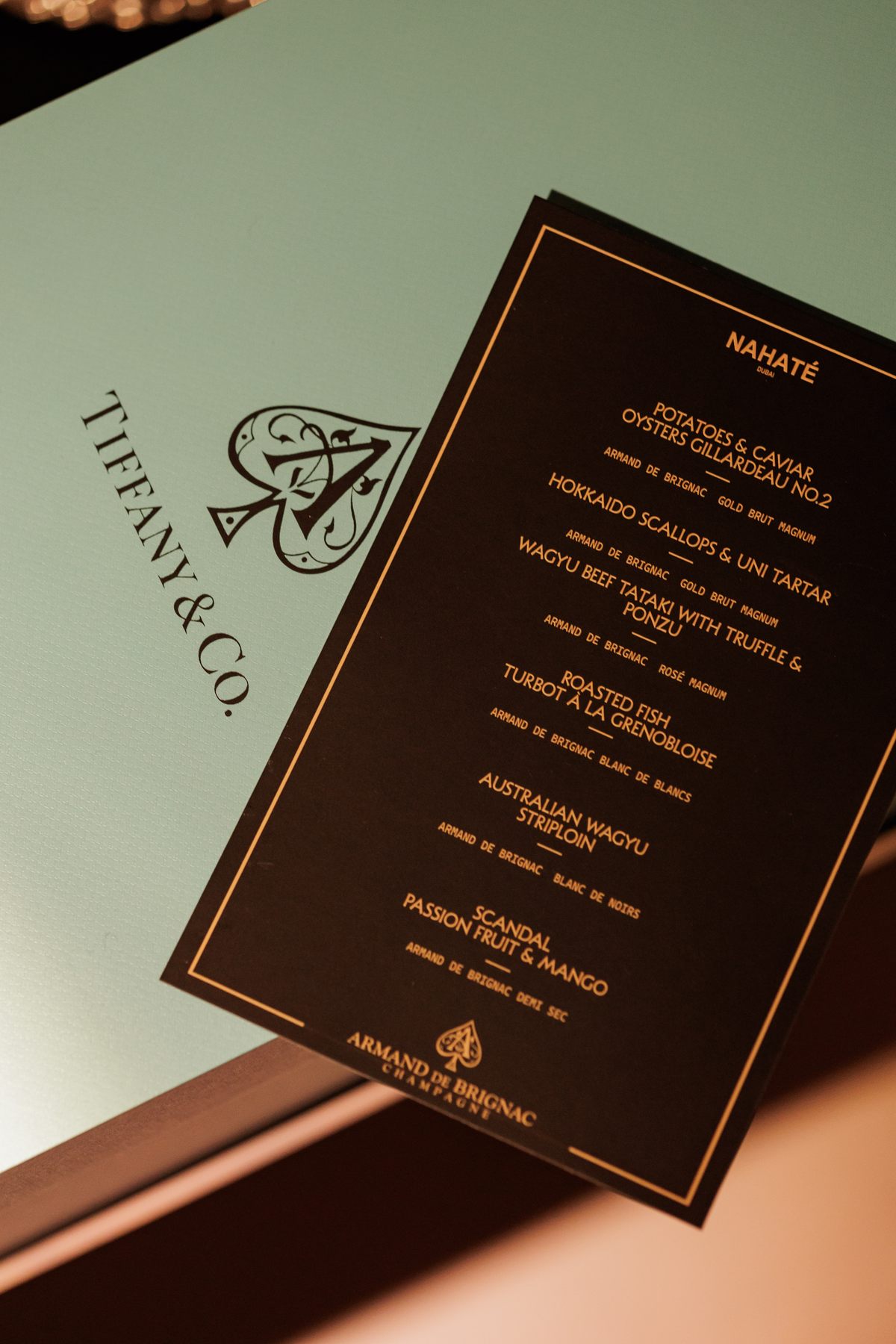 Mr K Nations receiving the Armand de Brignac and Tiffany & Co. collector bottle at NAHATÉ Dubai — selected frame 13