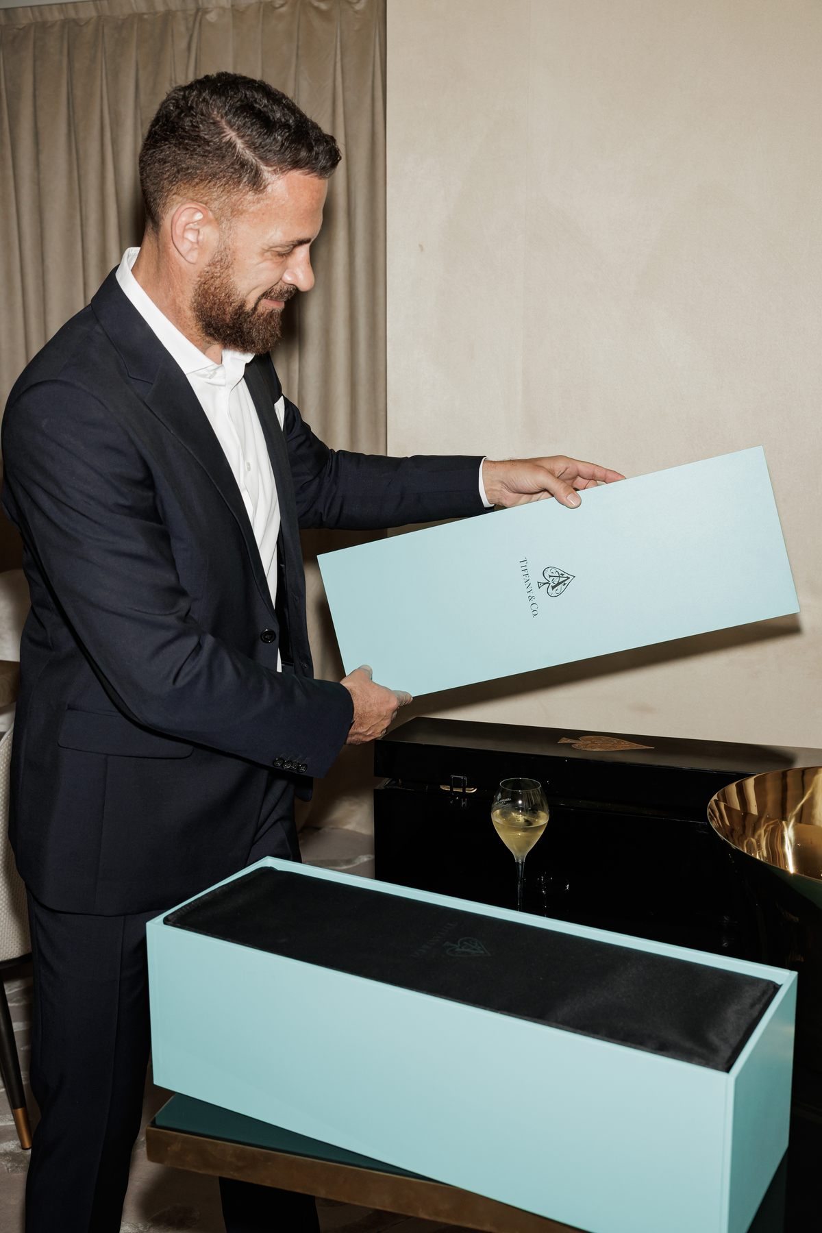 Mr K Nations receiving the Armand de Brignac and Tiffany & Co. collector bottle at NAHATÉ Dubai — selected frame 28