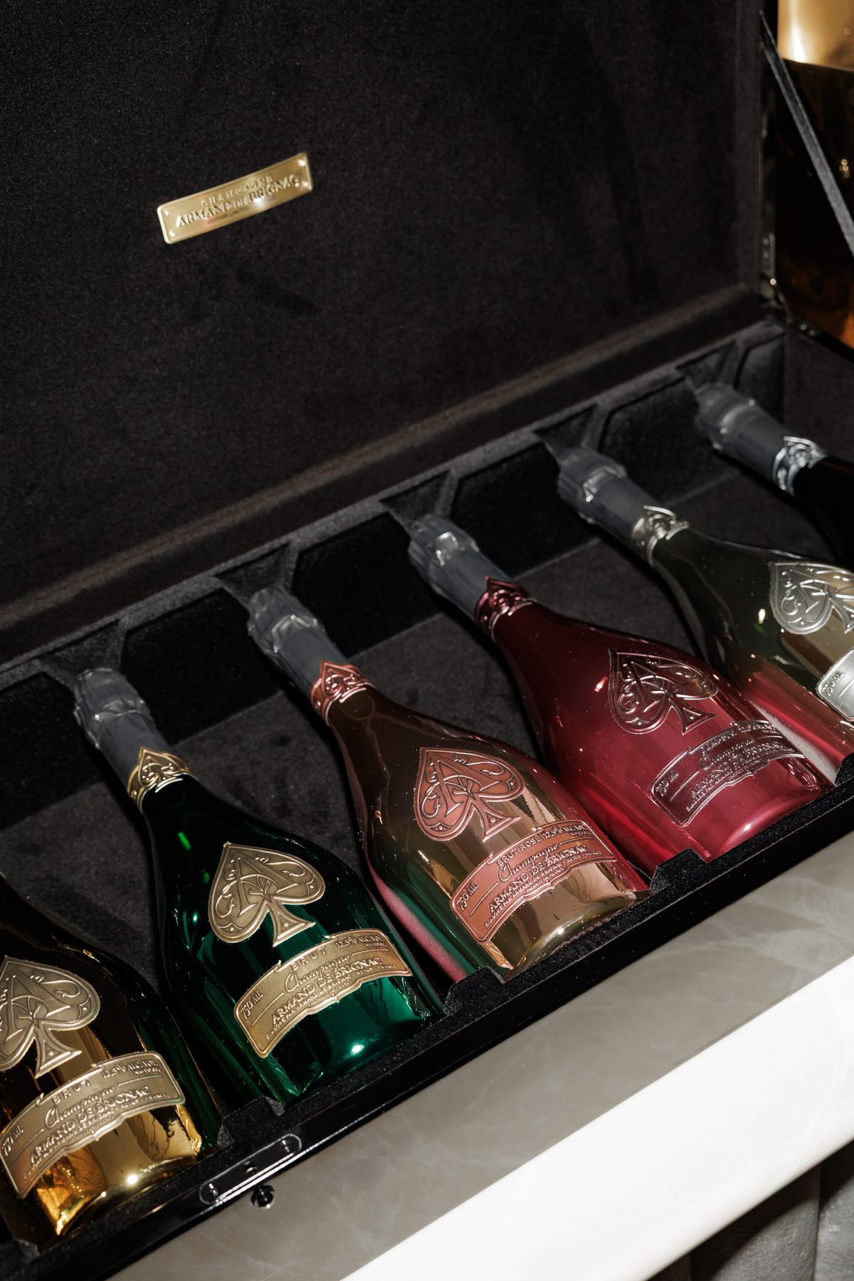 Mr K Nations receiving the Armand de Brignac and Tiffany & Co. collector bottle at NAHATÉ Dubai — selected frame 14