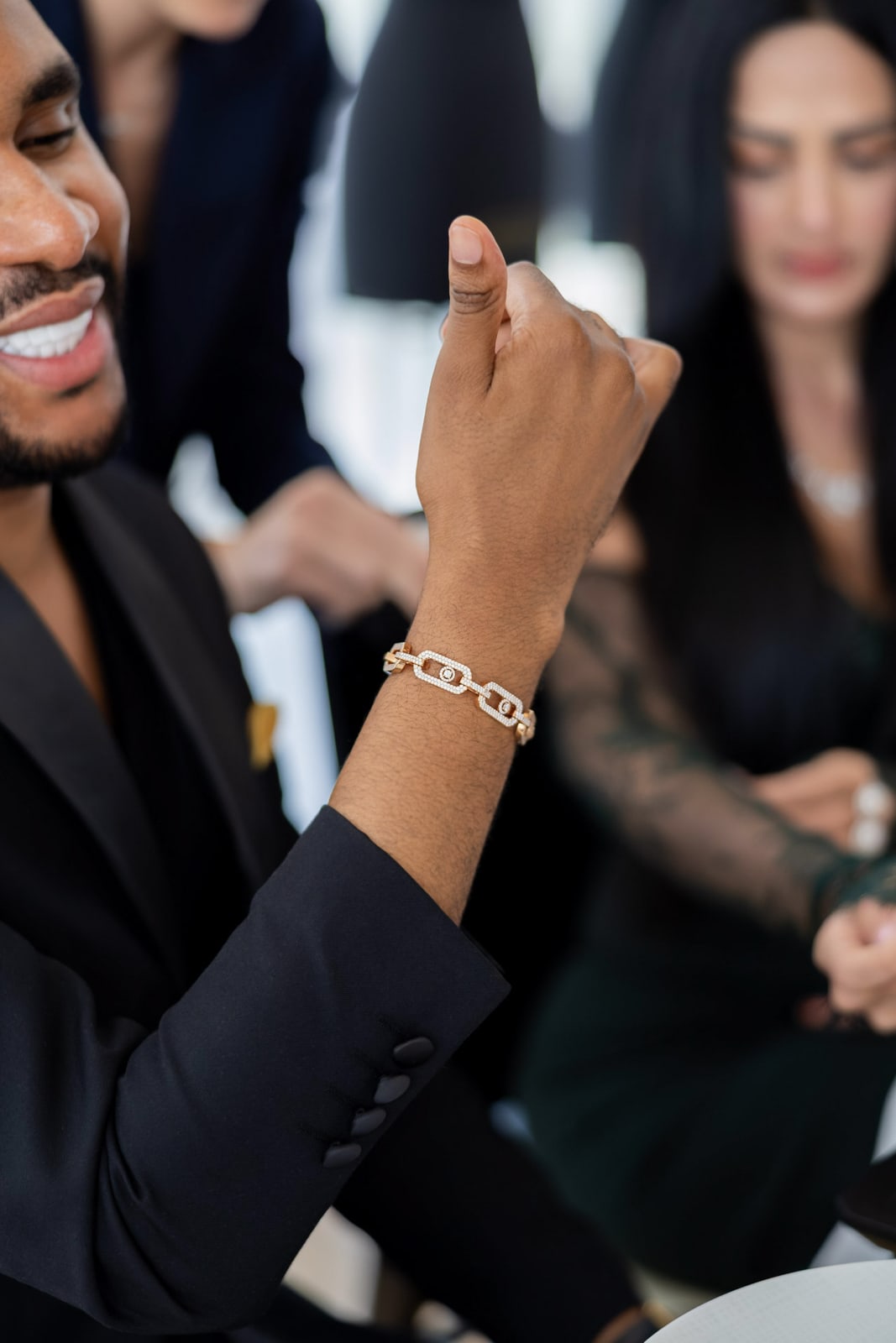 A jewellery detail at an evening gathering