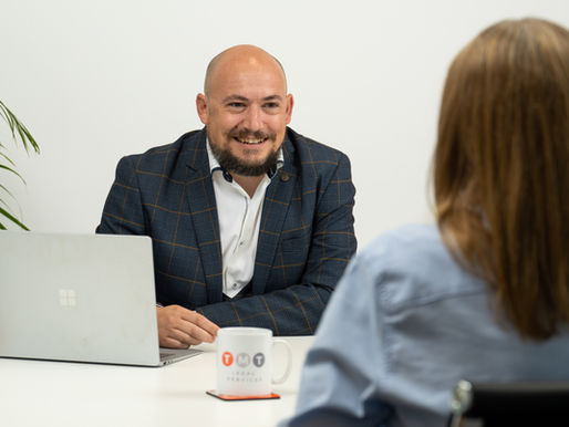 kevin danez smiling at a client