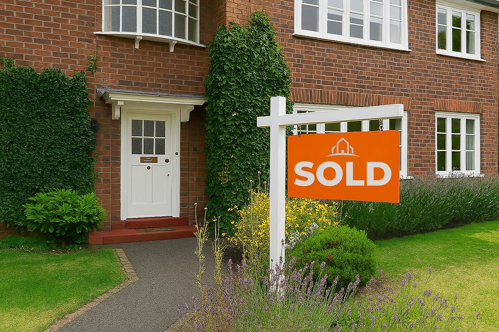 A property with an orange SOLD sign hanging outside