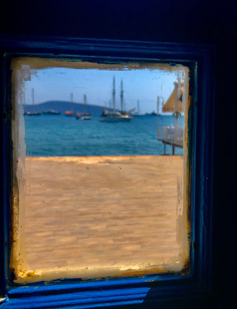 Through the window.