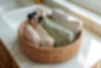 neurodivergent home organization: several makeup bags in a basket