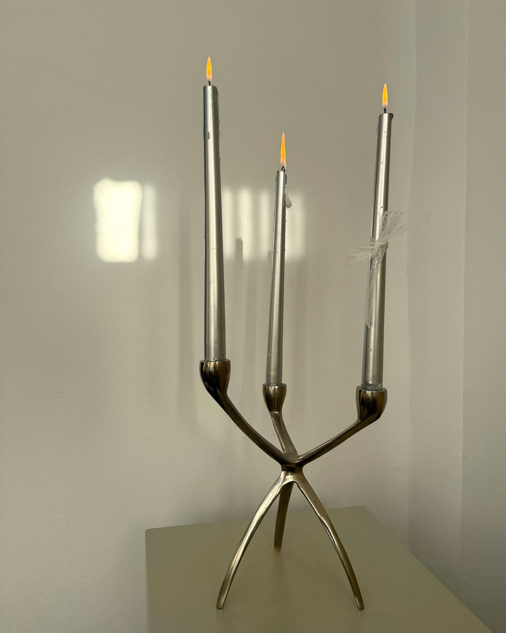 scandinavian tripod candelabra