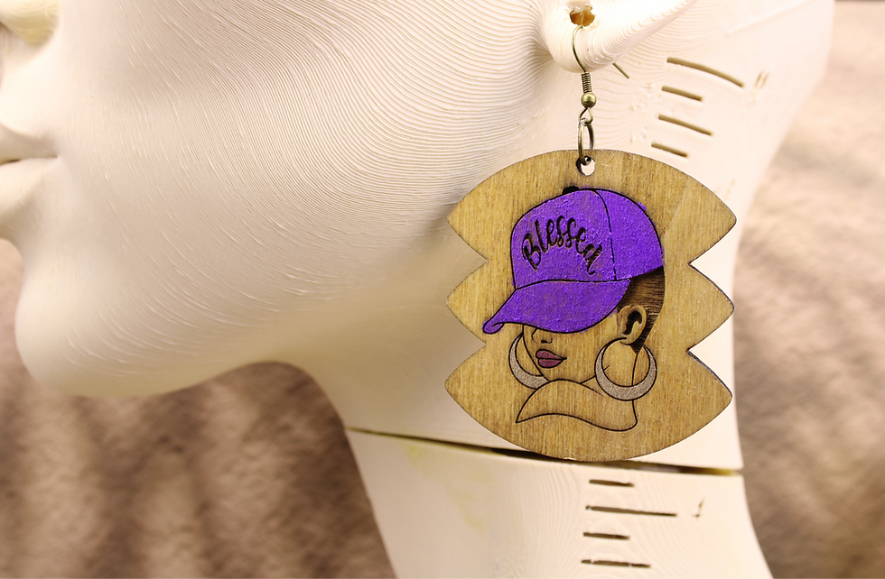 Wooden earring with a woman wearing a purple Blessed cap