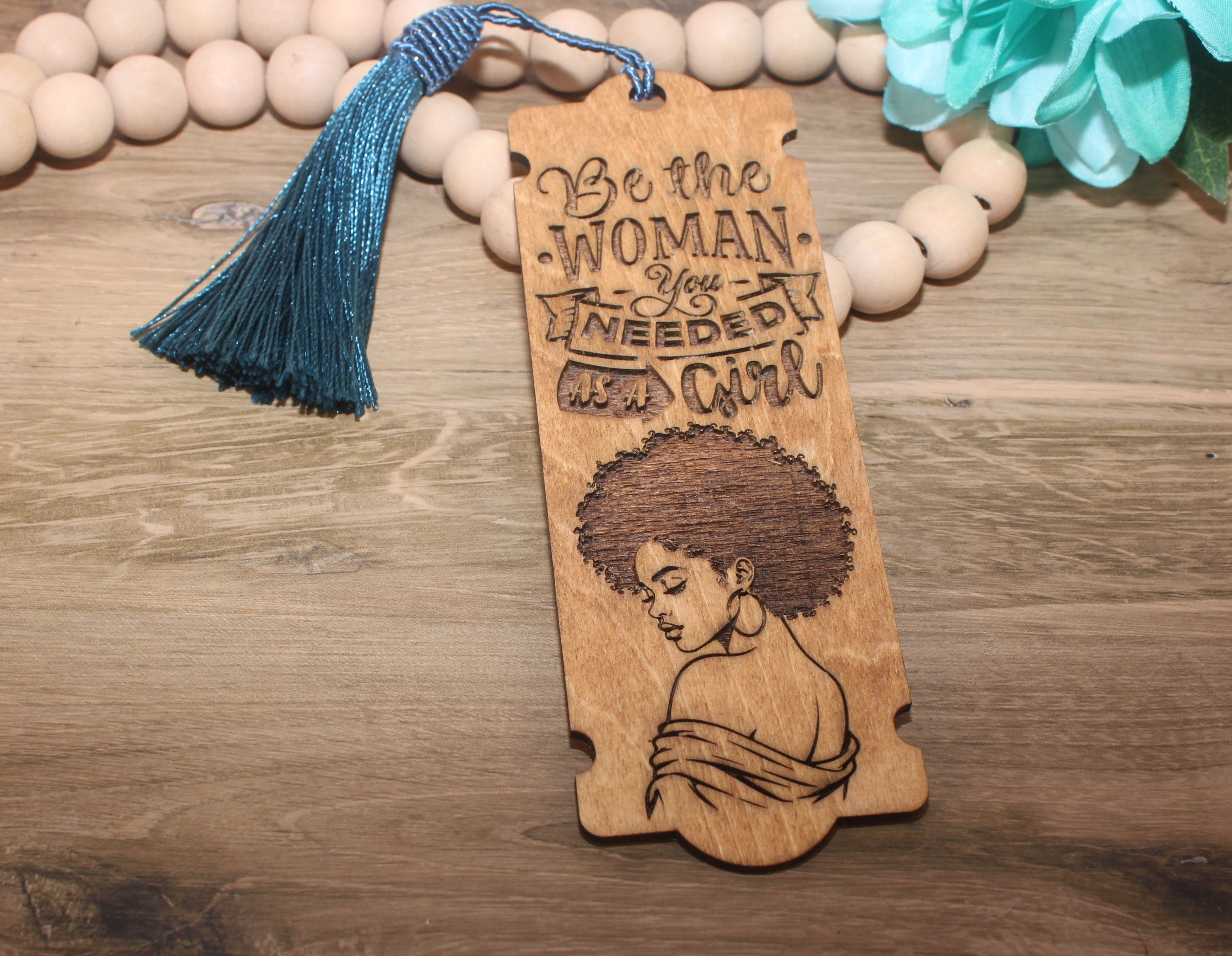 Wooden bookmark: Be the Woman You Needed as a Girl.