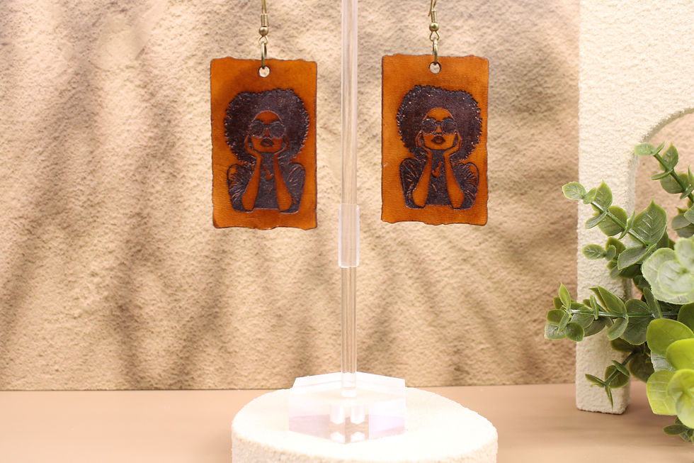 Unbothered & Beautiful rectangular earrings on display
