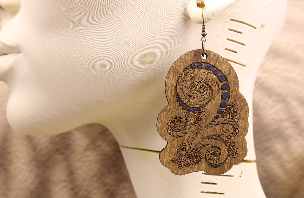 GTC292 Royal Paisley engraved wooden earring on a mannequin